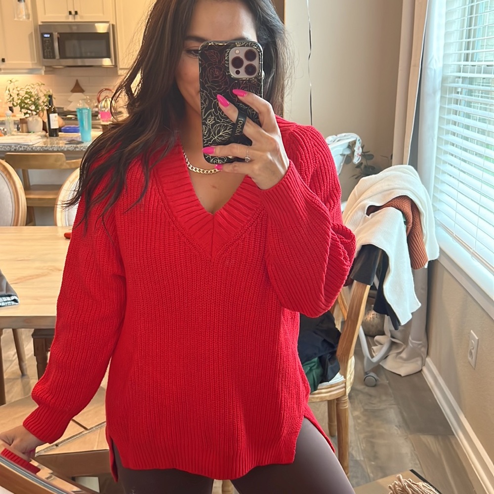 Red V-neck sweater